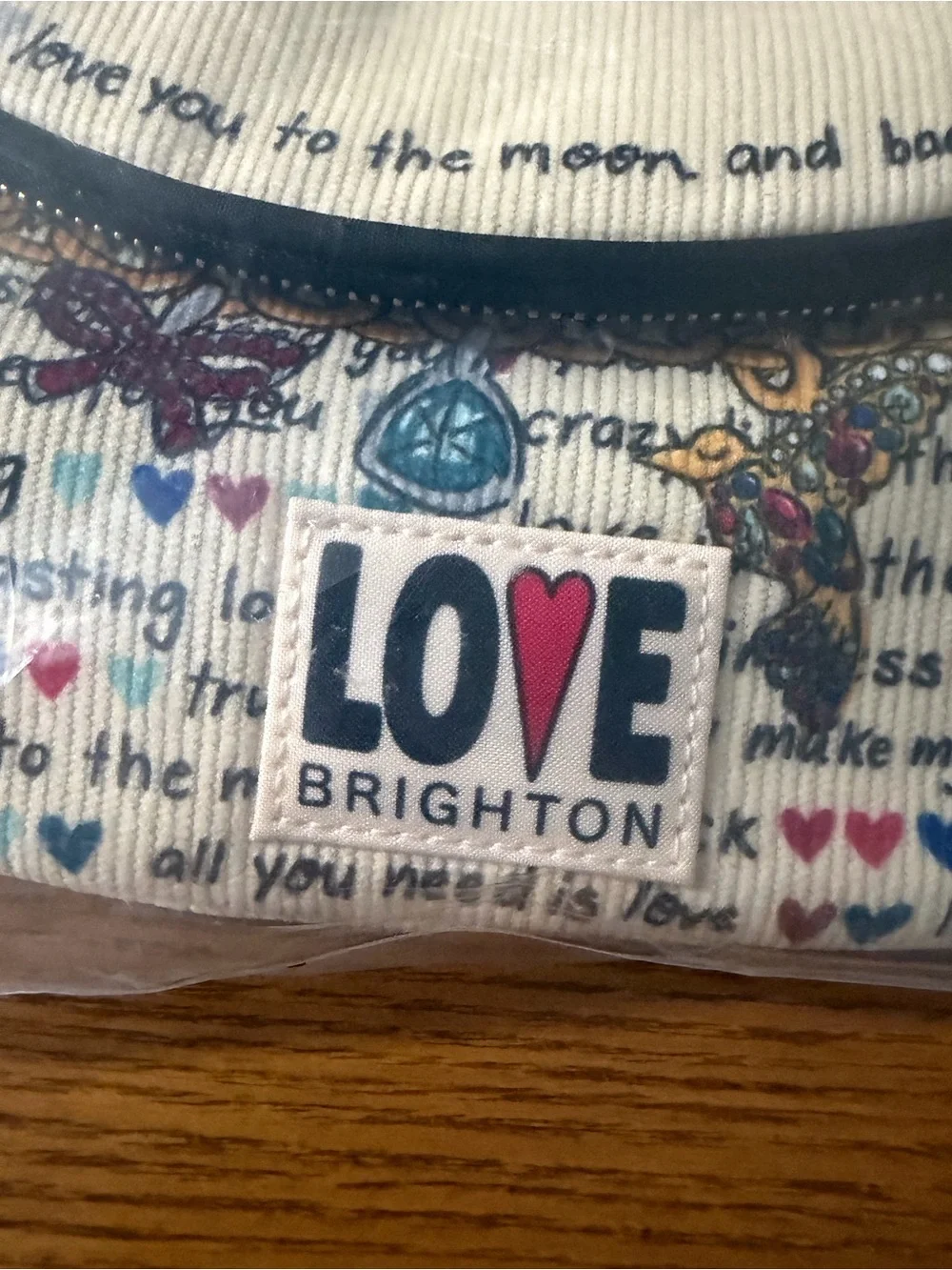 Brighton cream clutch